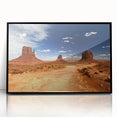 Large abstract wall art of Monument Valley in muted earth tones on a framed acrylic, suitable for modern living room decor.