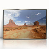 Mid-century modernist art depicting Monument Valley in muted earth tones on a framed acrylic panel.