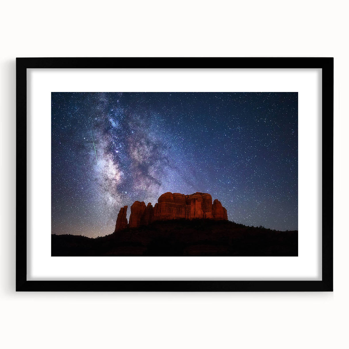 Abstract art print of Sedona landscape in vibrant colors on a large framed canvas, suitable for living room decor.