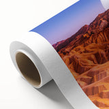 Art deco poster of Death Valley landscape in pastel shades on rolled canvas, suitable for dining room decor.