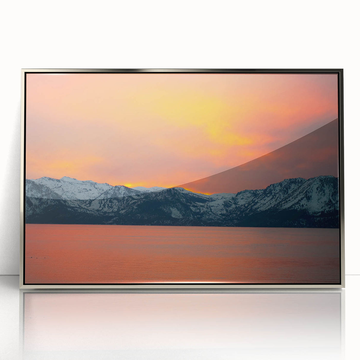 Mid-century modernist art depicting Lake Tahoe in muted blue and green tones on a silver-framed acrylic print.