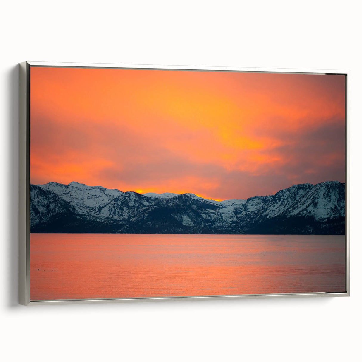 Framed canvas wall art featuring a serene Lake Tahoe landscape in muted blues and greens, ideal for bedroom decor.