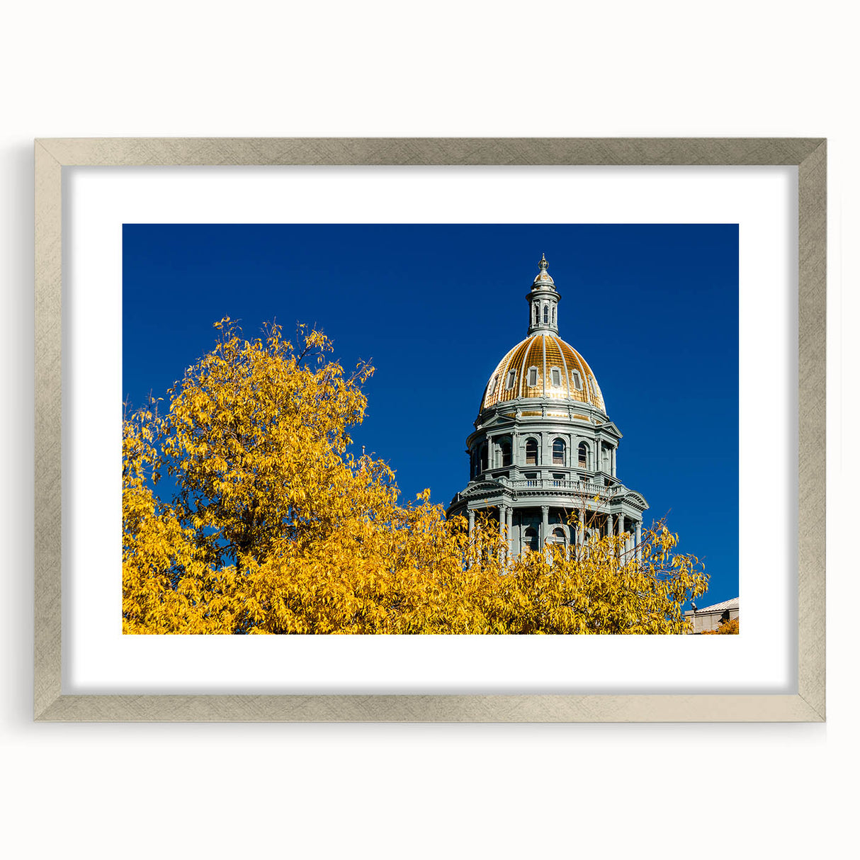 Textured abstract art print of Denver skyline in muted silver and gray tones on a framed canvas, ideal for bedroom art.