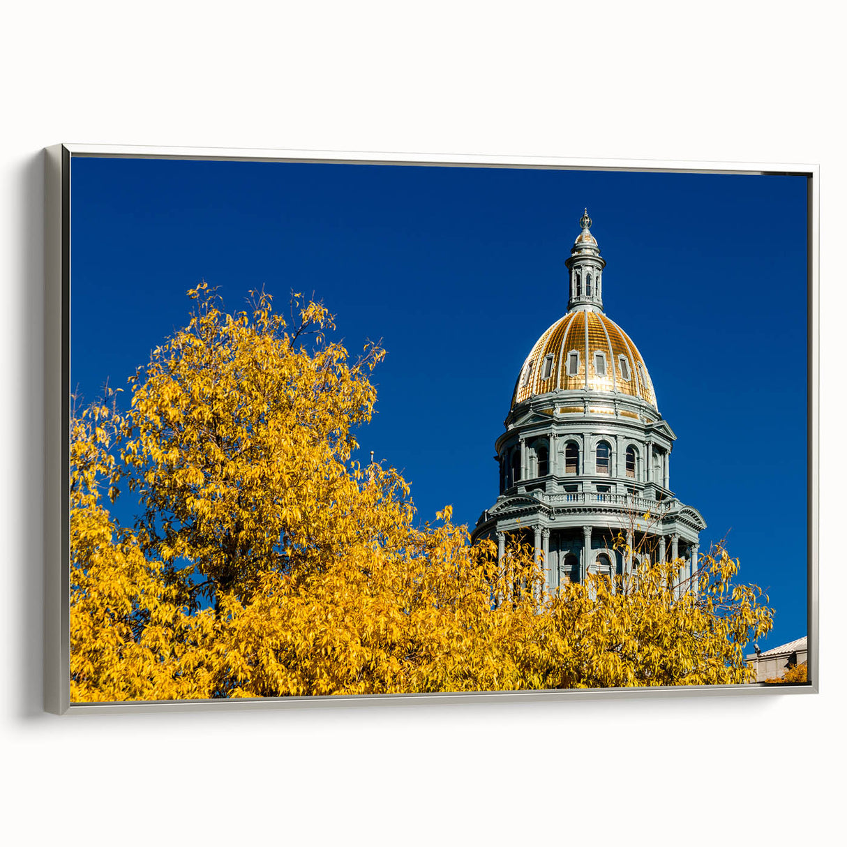 Framed canvas of vintage Denver landscape with colorful art on black background, ideal for living room decor.