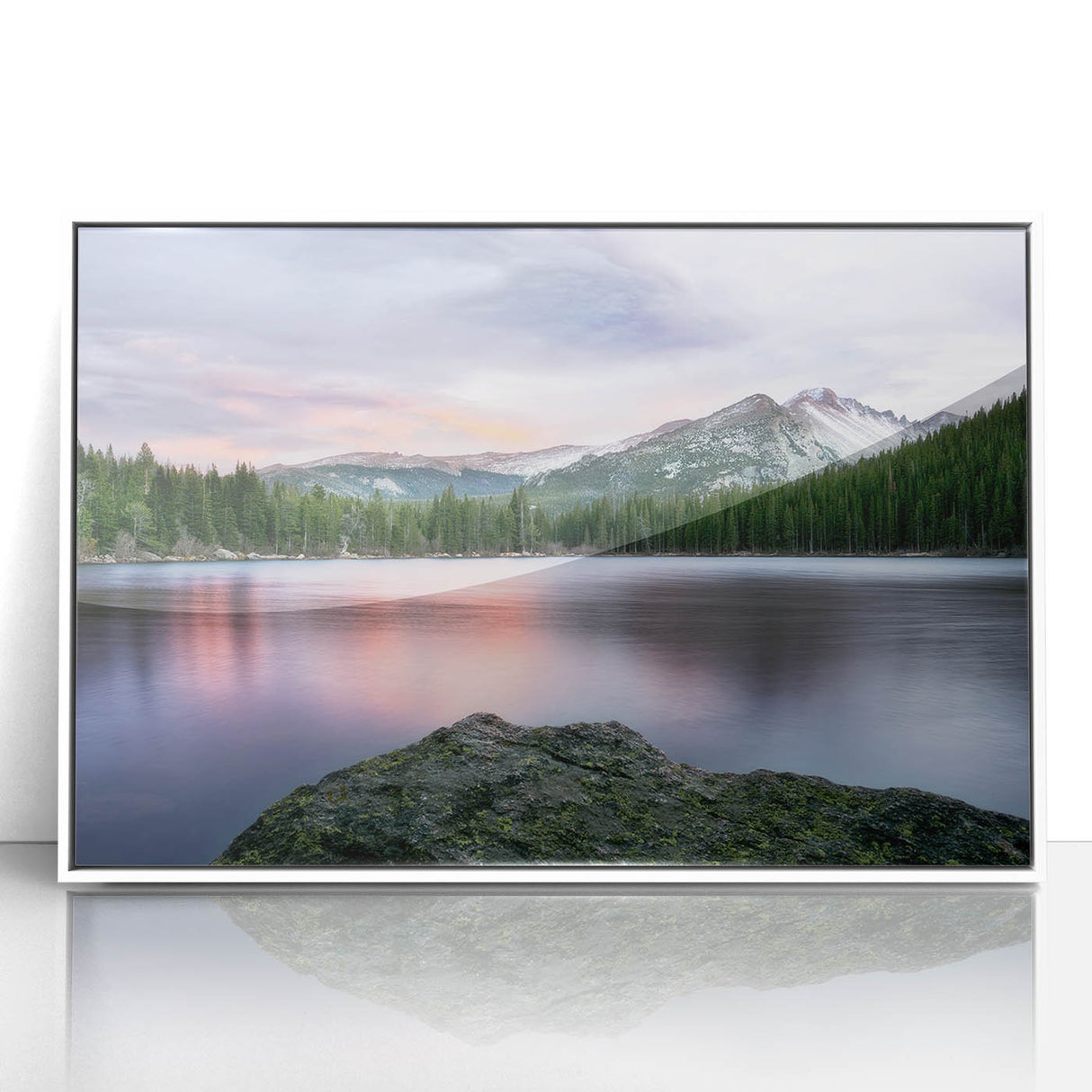 Acrylic print of the Rocky Mountains in muted earth tones, framed in white, suitable for modern art wall decor or nursery.