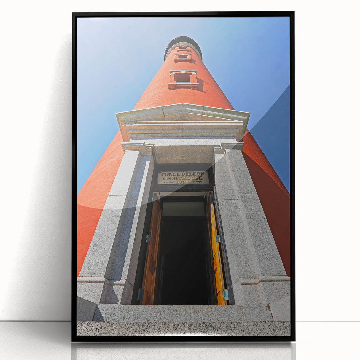Large abstract wall art depicting the Daytona skyline in muted gray and blue tones on a framed acrylic.