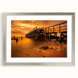 Abstract textured art print of Delaware scenery in muted earth tones, framed in silver, ideal for bedroom wall decor.