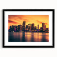 Extra large abstract art print of vibrant Miami scenery on a textured canvas, framed in black.