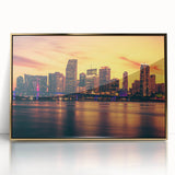 Acrylic print of Miami skyline in gold and blue tones, framed, mid-century modernist style.