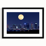 Abstract art print of Tampa scenery in colorful, textured strokes on a large black-framed canvas.