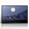Large abstract wall art depicting the Tampa skyline in muted gray and blue tones on a framed acrylic print.