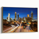 Framed canvas depicting the Atlanta skyline in muted gold and black tones, ideal for bedroom wall art.