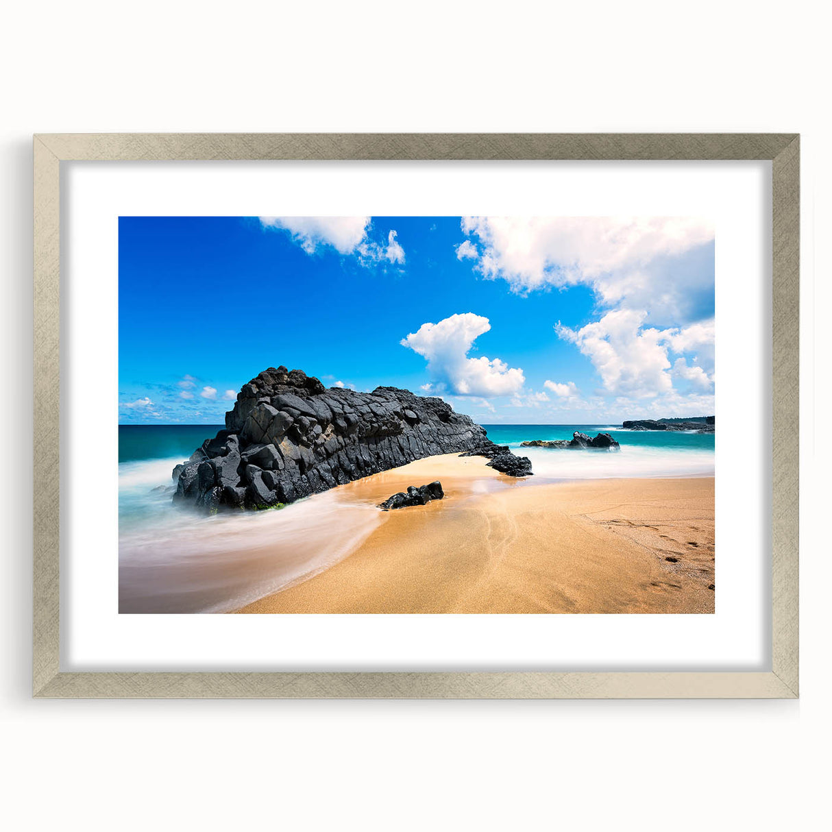 Textured art print of abstract Kauai scenery in muted green and blue tones, framed in silver, ideal for bedroom art.
