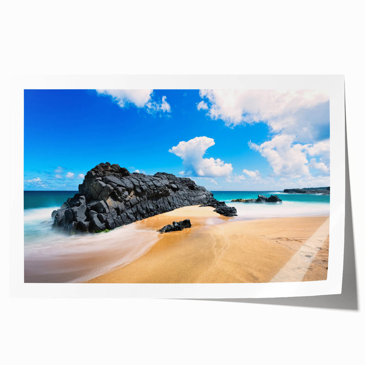 Rolled print of a Kauai landscape featuring lush greenery and waterfalls, in vibrant green and blue tones.