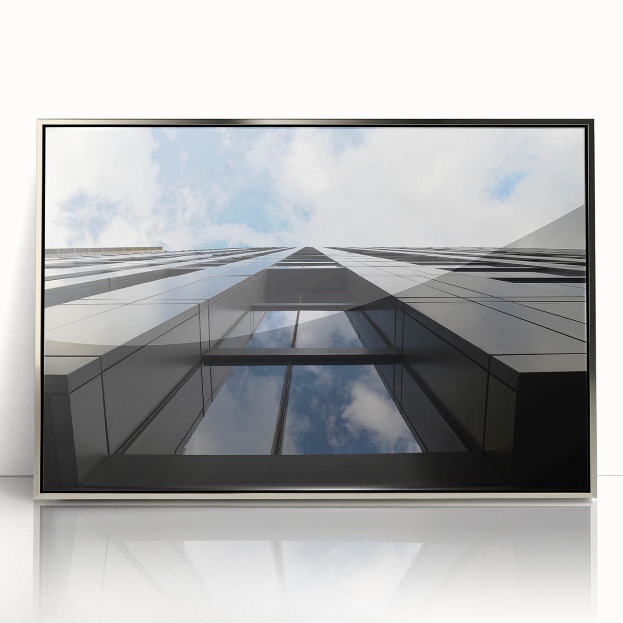 Mid-century modernist art depicting the Chicago skyline in muted silver tones on a framed acrylic print.