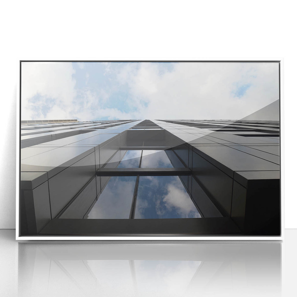 Framed acrylic print of the Chicago skyline in art deco style, featuring bold black and white contrasts.