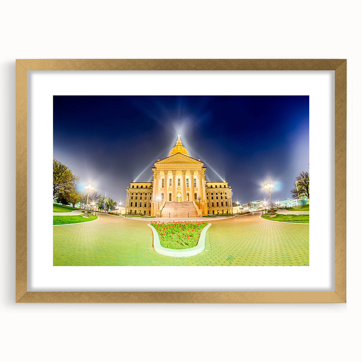 Extra large wall art featuring an abstract depiction of Kansas scenery in textured gold and earth tones, framed with a mat.