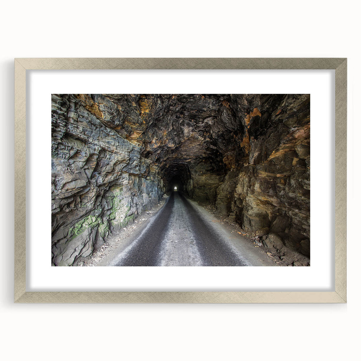 Textured art depicting abstract Kentucky scenery in muted earth tones, framed in silver, suitable for bedroom decor.