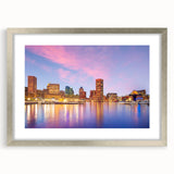 Textured abstract art print of Baltimore skyline in muted blue and gray tones on a framed canvas, suitable for bedroom decor.