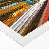 Art deco poster of Boston skyline in muted blue tones on rolled canvas, suitable for dining room wall art.