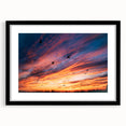 Abstract art print featuring textured, colorful swirls on a large canvas, ideal for living room ambiance.