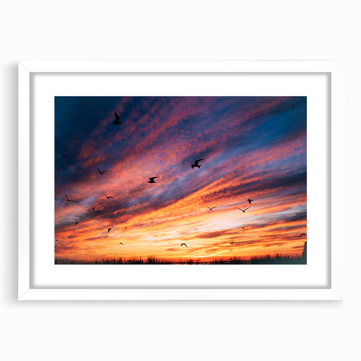 Abstract art print of a Massachusetts Nantucket landscape in muted blue and gray tones on a framed white mat.