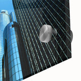 Large abstract depiction of Detroit skyline in muted earth tones on acrylic glass, ideal for dining room art.