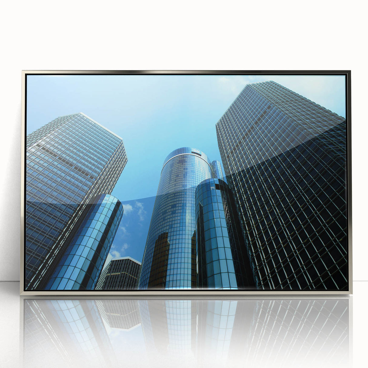 Mid-century modernist art of Detroit skyline in muted gray and blue tones on a framed acrylic print.