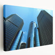 Side view of a stretched canvas featuring a detailed Detroit cityscape in muted gray and blue tones.