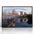 Large abstract wall art depicting the Minneapolis skyline in muted gray tones on a framed acrylic print.