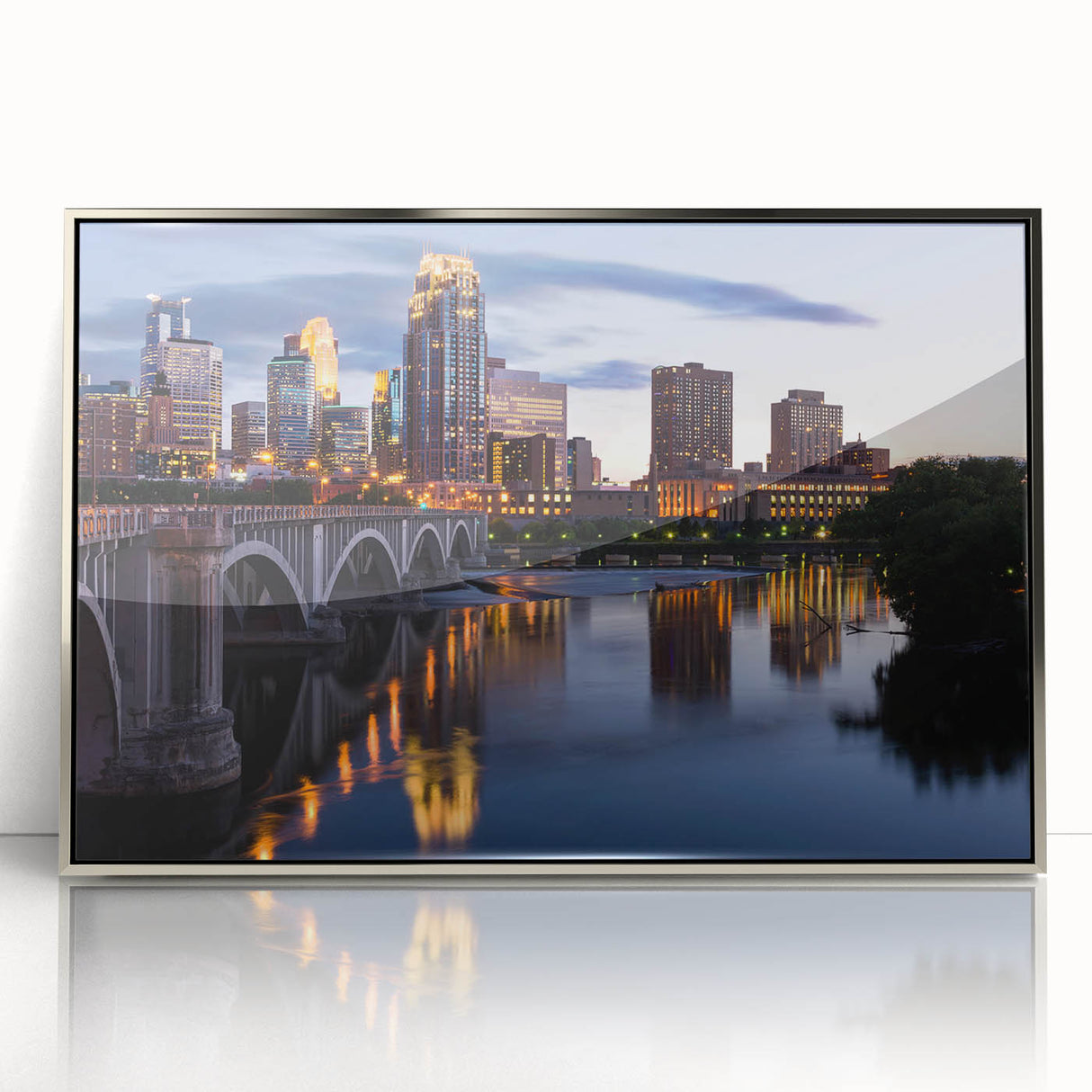 Mid-century modernist art depicting the Minneapolis skyline in muted blue and silver tones on a framed acrylic print.