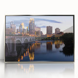 Mid-century modernist art depicting the Minneapolis skyline in muted blue and silver tones on a framed acrylic print.