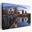 Large art print of the Minneapolis skyline in muted gray and blue tones on stretched canvas, ideal for kitchen wall decor.