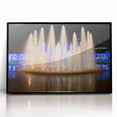 Large abstract wall art depicting Kansas City skyline in muted gray and blue tones, framed in black acrylic.