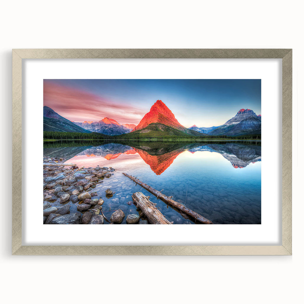 Textured art depicting abstract Montana glacier scenery in muted blue and white tones, framed with a silver mat.