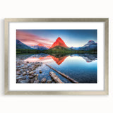 Textured art depicting abstract Montana glacier scenery in muted blue and white tones, framed with a silver mat.