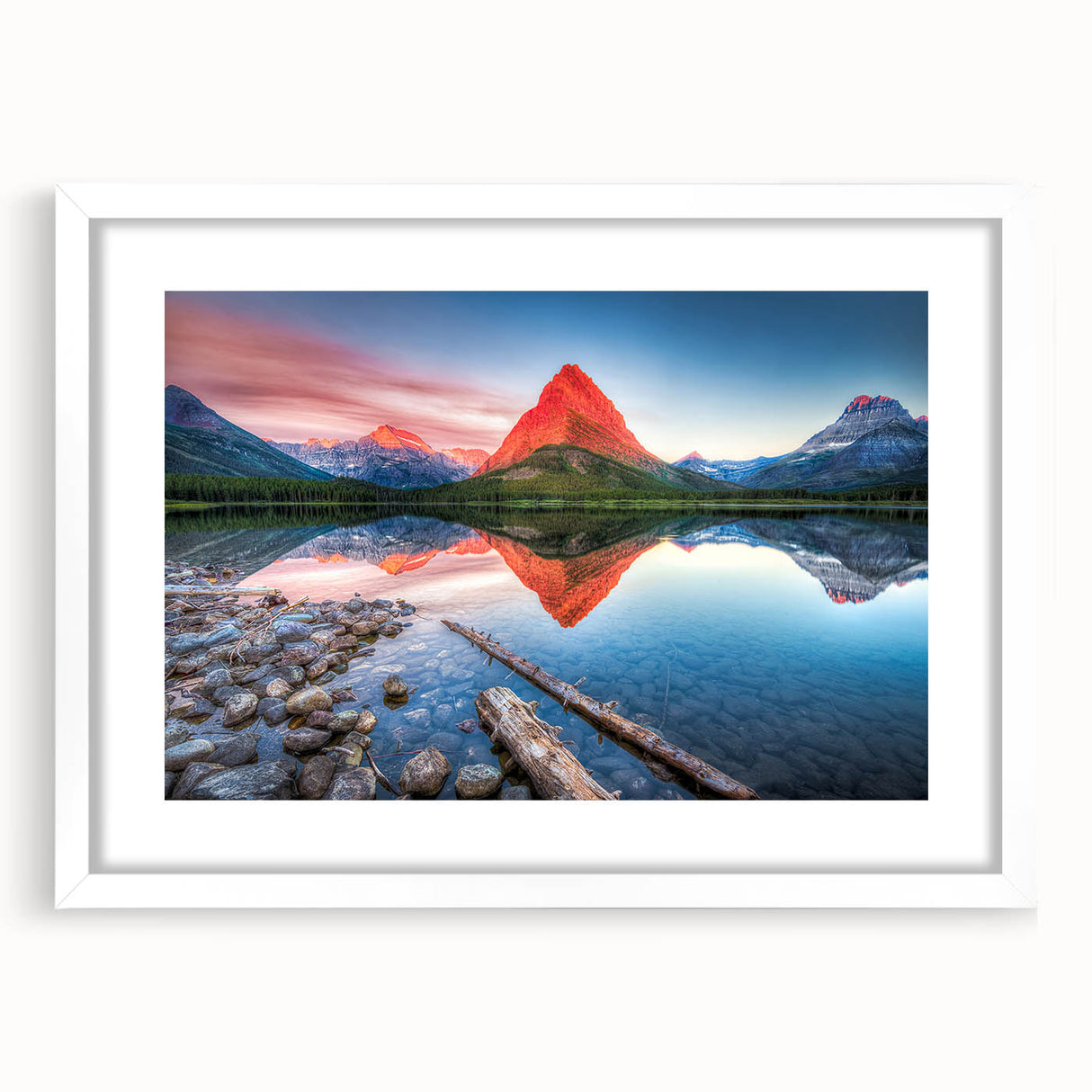 Abstract art print of Glacier National Park in muted blue and white tones on a framed white mat, ideal for dining room decor.