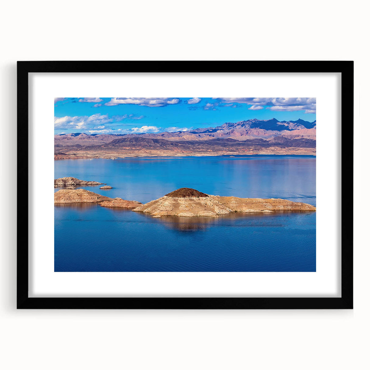 Abstract art print of Lake Mead with vibrant, textured colors on a large framed canvas, ideal for living room decor.