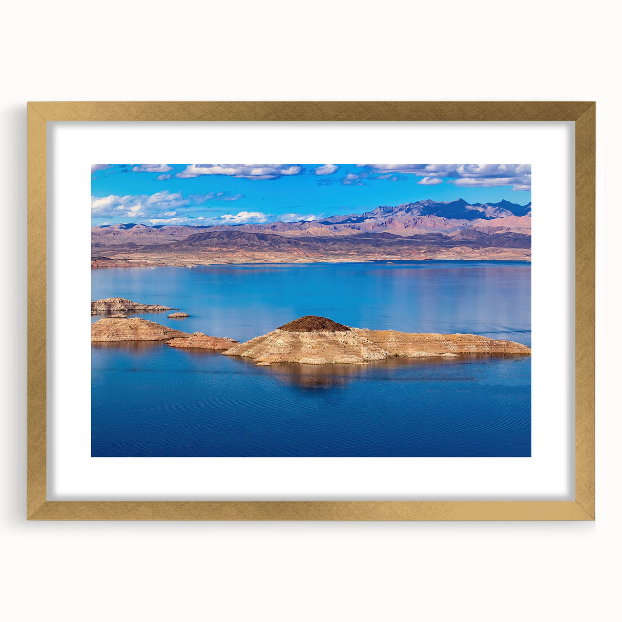 Extra large wall art of abstract Lake Mead in textured hues, framed in gold, ideal for living room decor.