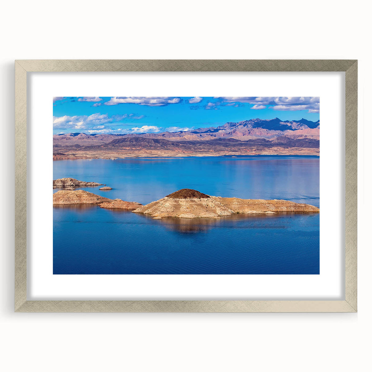 Textured abstract art print of Lake Mead, Nevada, in muted blues and greens, framed in silver, ideal for bedroom art.