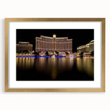 Extra large textured abstract art print of Las Vegas scene in vibrant colors on a gold-framed canvas.