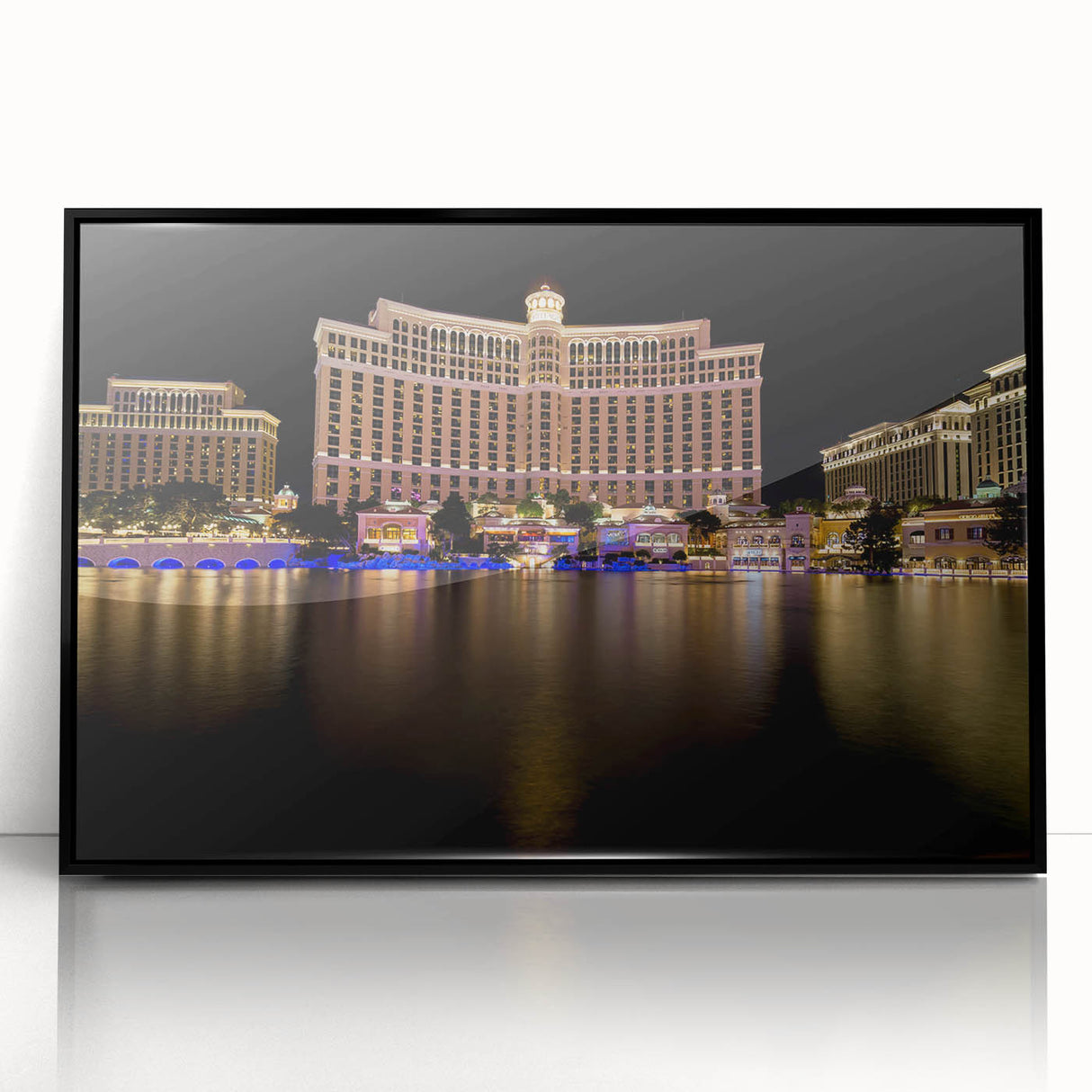 Large abstract wall art depicting the Las Vegas skyline in vibrant neon colors on a black acrylic frame.
