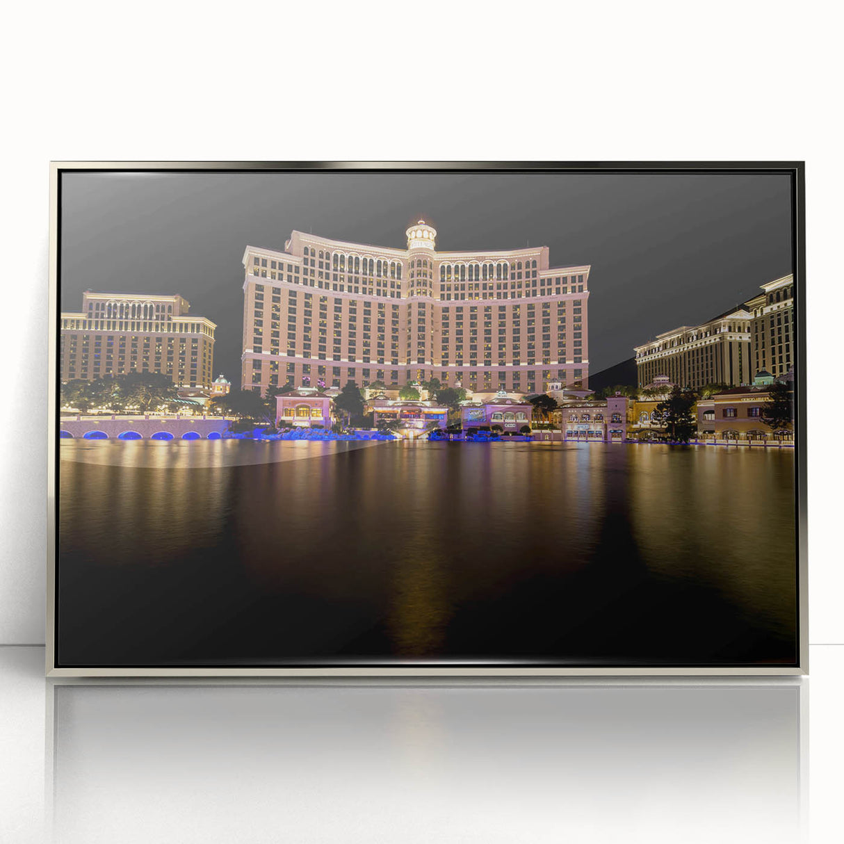 Mid-century modernist art depicting Las Vegas skyline in muted silver tones on a framed acrylic print.