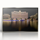 Mid-century modernist art depicting Las Vegas skyline in muted silver tones on a framed acrylic print.