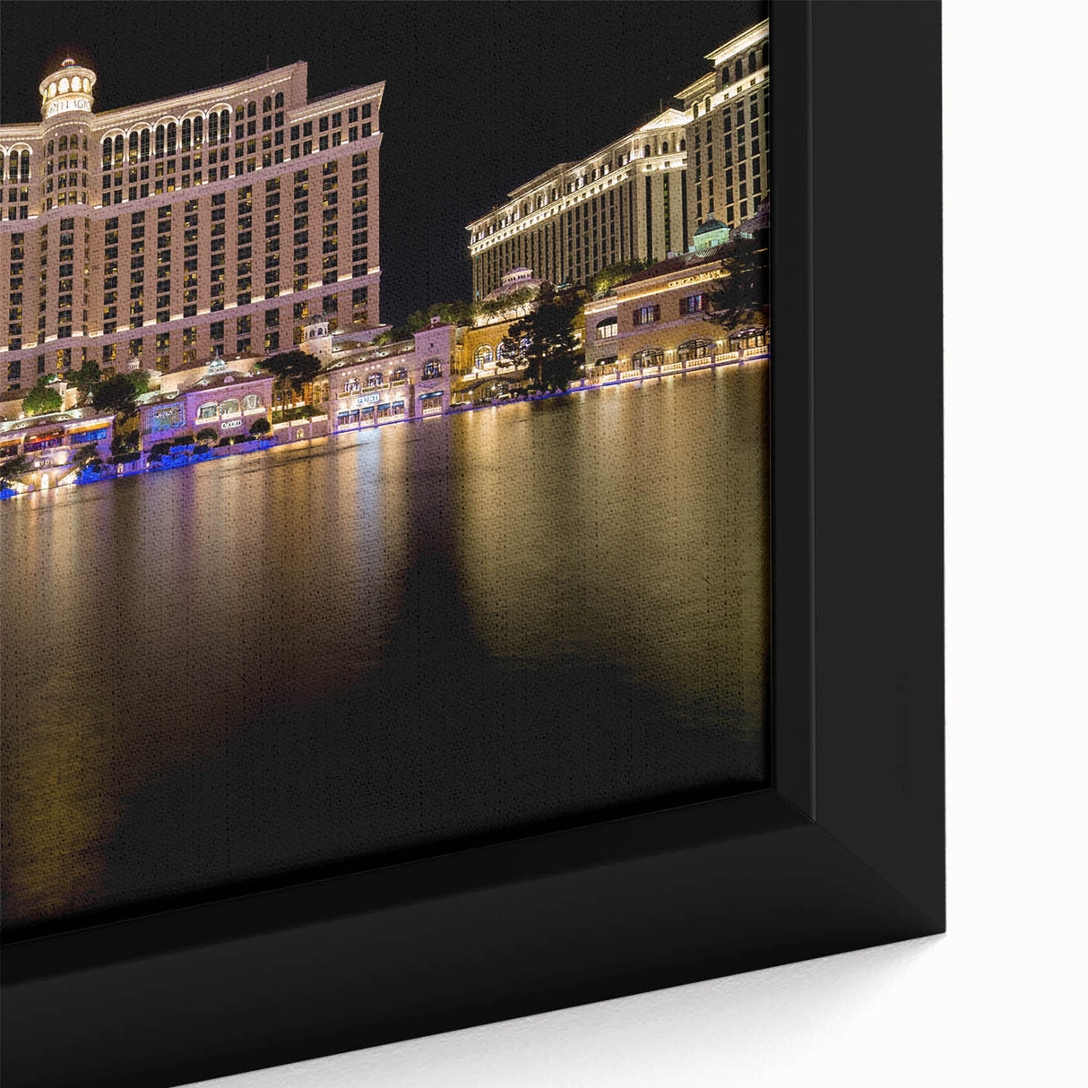 Black wall art featuring a textured Las Vegas scene with vibrant, colorful details on a framed canvas.