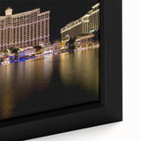 Black wall art featuring a textured Las Vegas scene with vibrant, colorful details on a framed canvas.