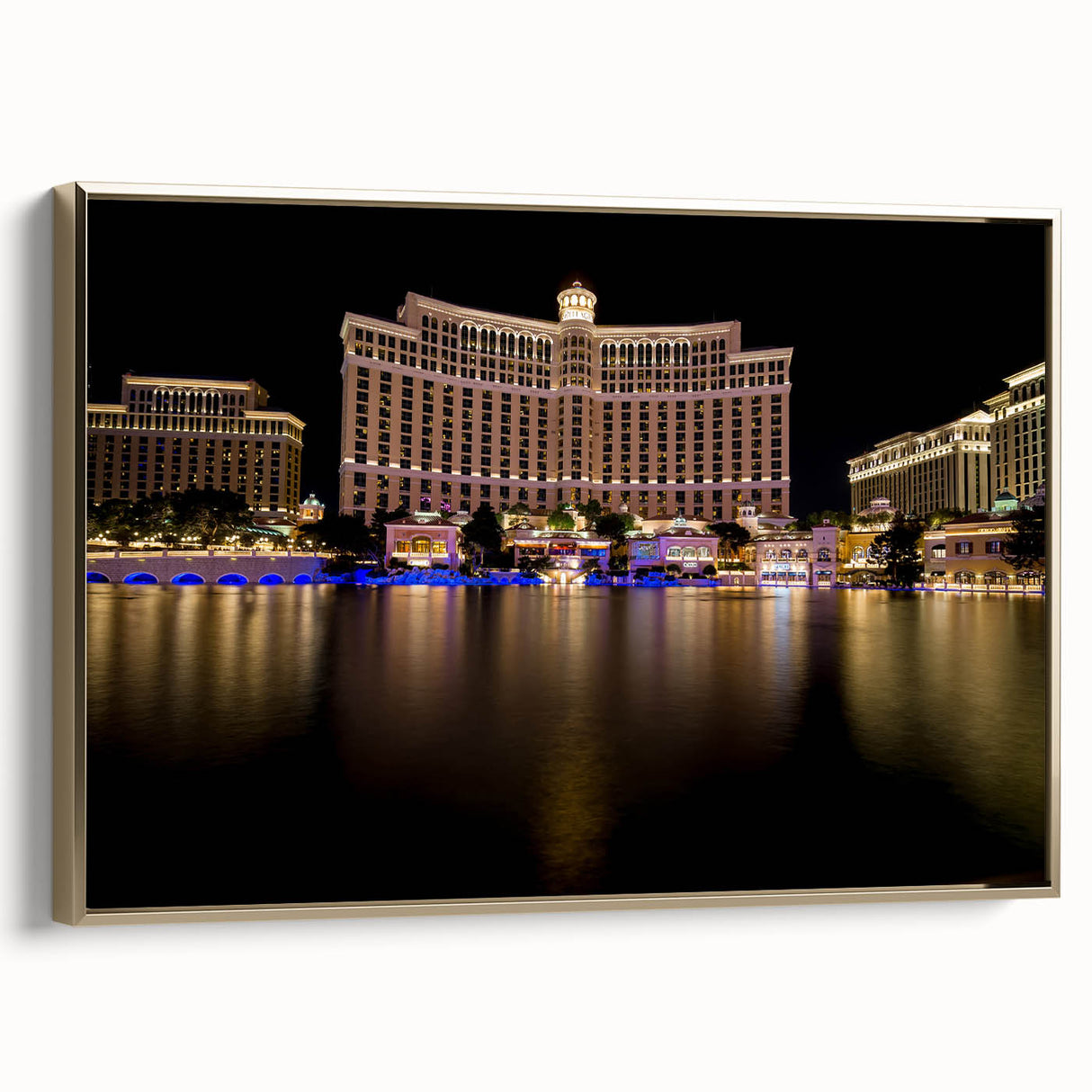 Framed canvas wall art depicting a vintage-style Las Vegas landscape in black and gold tones, ideal for bedroom decor.