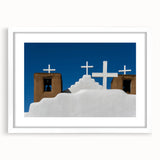 Abstract art print depicting New Mexico scenery in muted earth tones on a white framed canvas.