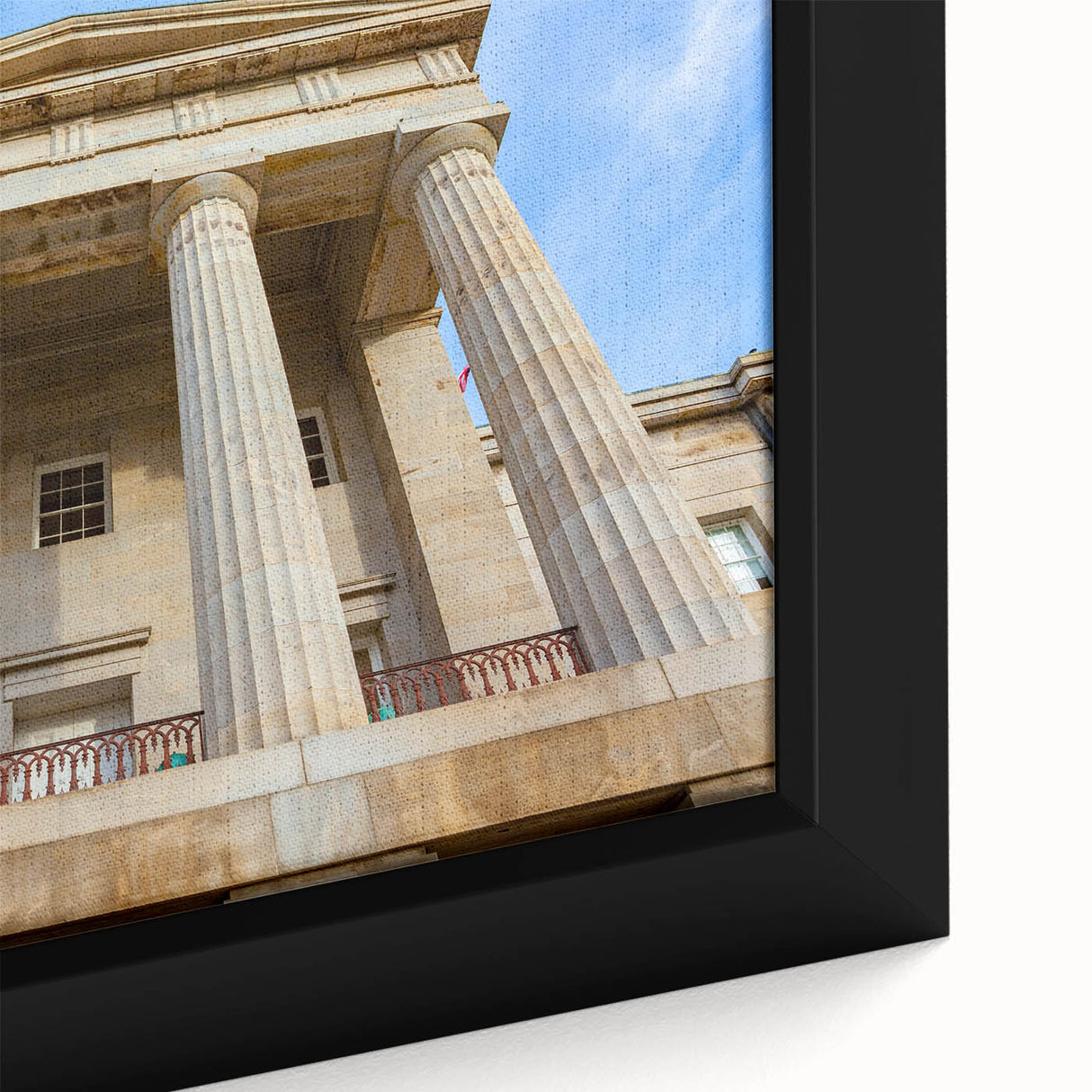 Textured black wall art of Raleigh skyline with colorful accents on a large framed canvas, ideal for living room decor.