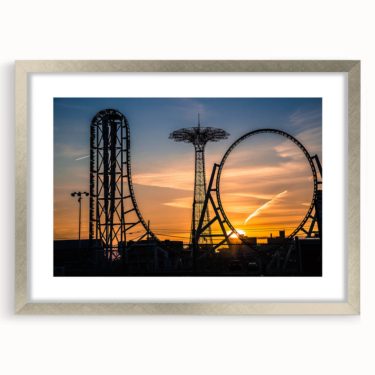 Textured abstract art print of Coney Island, featuring muted blues and grays on a framed silver mat.